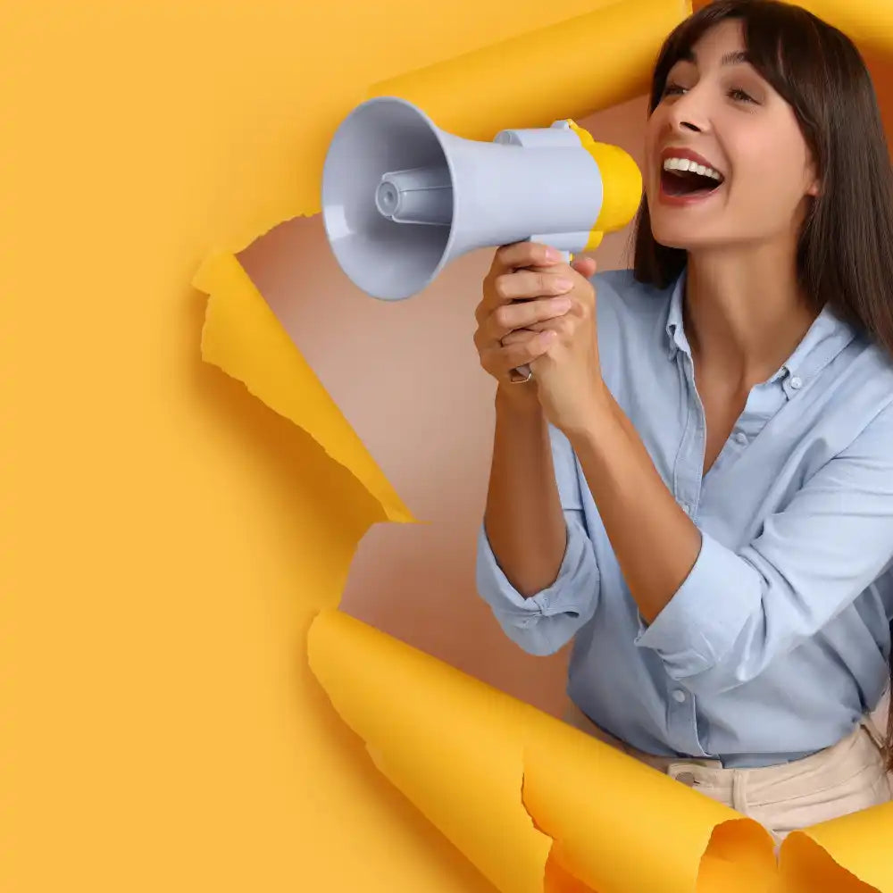 Gray handheld megaphone with white details.